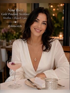 Nina Ricci Gold Pendant Necklace with Crystal Teardrop Pendant + Logo